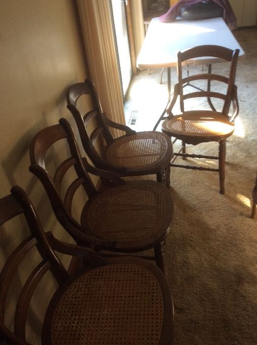 4 vintage rattan bottom chairs