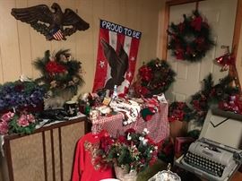Vintage typewriter, lots of Christmas wreaths and décor, military items