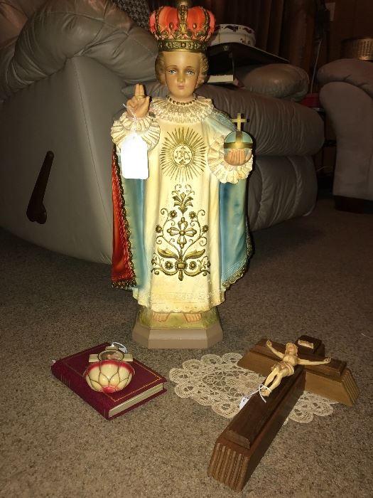 Old chalk ware Infant of Prague statue and other religious items