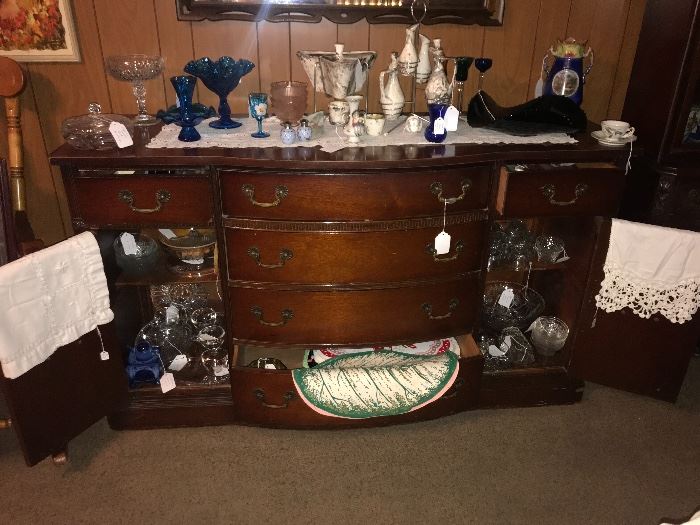 Bow front buffet and a variety of china pieces