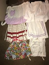 Assortment of beautiful vintage aprons