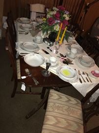 Duncan Phyfe dining table with set of 6 chairs, China set and silver plated flatware set
