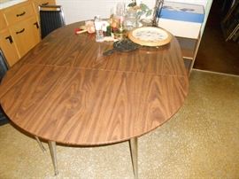 70's oval table with chrome legs