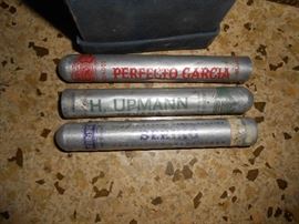 Thin metal cigar holders