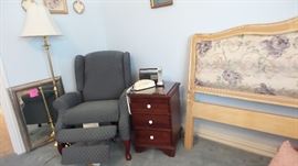 wing back recliner, small solid wood table, framed mirrors. king headboard, standing lamps