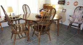 Queen ann round table with leaves to oval.  Spindle back chairs