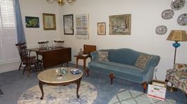 Living room.  Plate display, Queen Ann Furniture, large wing back chairs. Drop leaf table, petite wood chairs, rugs large to small 