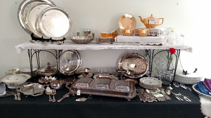 silver plate serving items along with lusterware tea set
