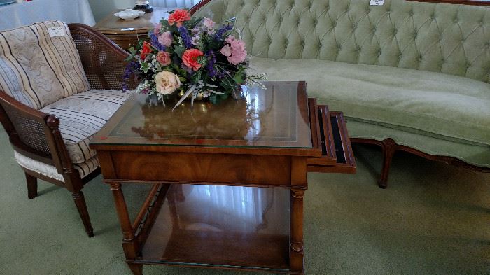 serving cart has 3 removable trays, leather top under glass with metal wheels