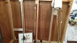 fishing poles, fishing jackets and vintage nets