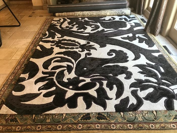 This fantastic area rug is 11' long x 8' wide