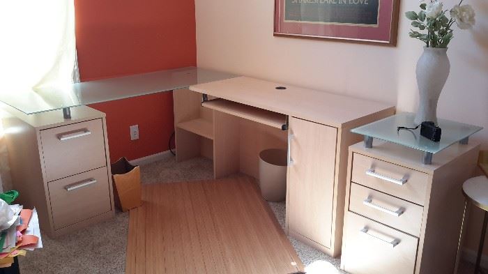 Blonde desk with partial glass top, drawers, filing cabinet and cabinet for computer tower.