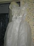 Wedding dress with underskirt and veil