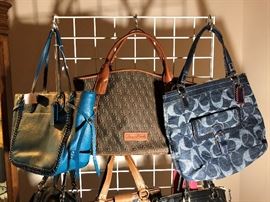 Dozens of designer purses including Coach, Michael Kors, Dooney and Bourke, Fossil, and more