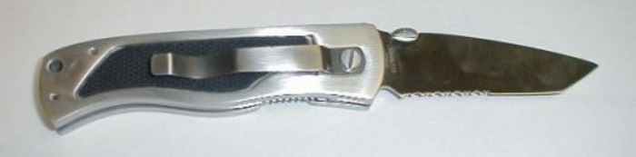 Jaguar Deluxe Knife with locking blade.  Has clip for shirt pocket storage.  Like new condition.  Made in China