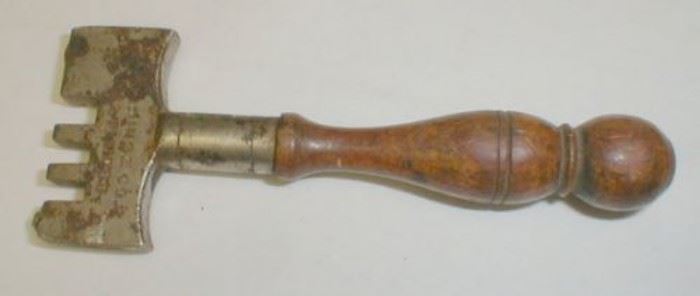 Victorian antique glass cutter with wood handle.  Some rust.  Partial signature readable.  Baltimore