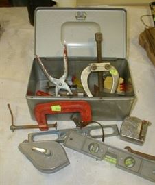 Assorted hand tools: two levels, c-clamp, Craftsman wheel puller, tape measure