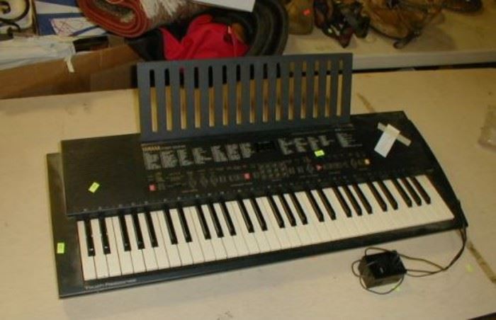 Yamaha PSR.300m keyboard.  

100 AWM VOICES
TOUCH RESPONSE
28 NOTE POLY
15 DEMO SONGS
50 AUTO ACCOMPANIMENTS STYLES
MIDI