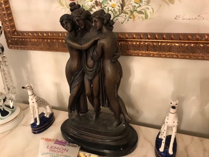 Item # 24. Three Graces spelter sculpture on marble base. 