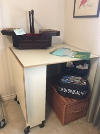 crafting -sewing table - lots of notions - sew baskets etc-  fabric ,   