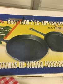 few new cast iron pans with box 