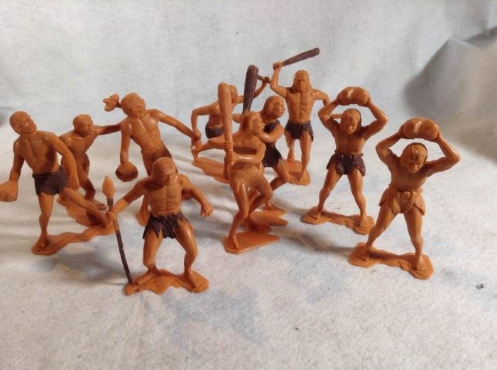 Nine Louis Marx ancient man figurines