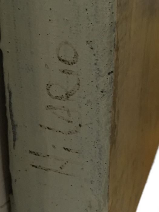 Artist Signature on side of "The Weight of Water II" by Hilario (Larry) Gutierrez