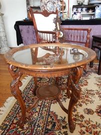 GLASS TOP ORNATE CARVED TABLE