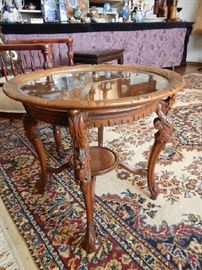 GLASS TOP ORNATE CARVED TABLE