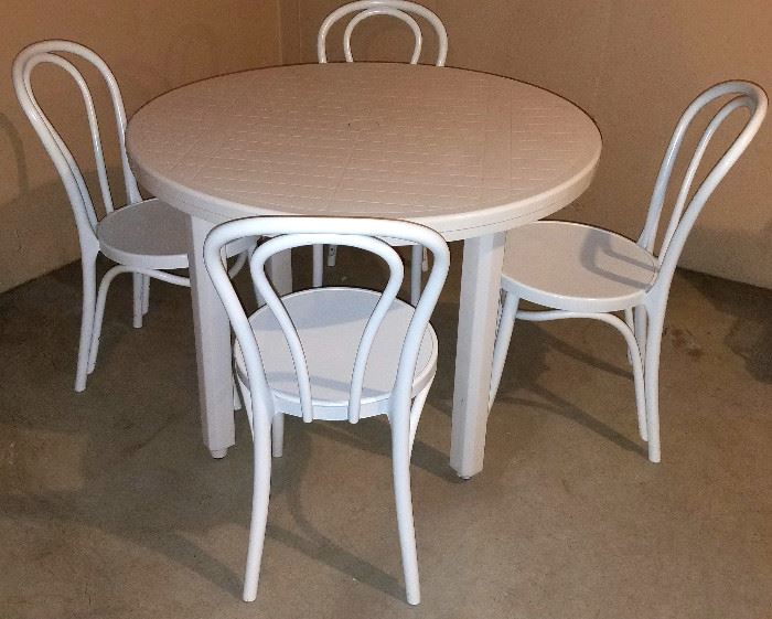 Resin patio table & four "ice cream" chairs