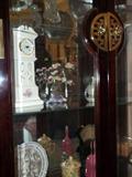 Solid wood curio cabinet.