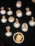 Hummel wall pockets and baby rings.