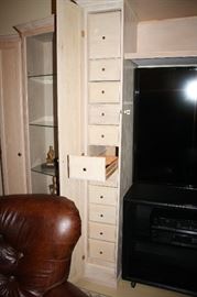 CD or DVD storage in entertainment center