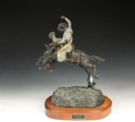 Wonderful Very Limited Edition Bronze Sculpture by Famed Western Sculpture Artist JAY CONTWAY (MT, 1935 – ) | Titled “Saddle Bronc” | Beautiful painted cast bronze | Artist Signed on base and numbered 10/24 | Mounted on a wooden base with a built-in concealed turntable | Titled on brass tag | Dimensions: Large 19 1/2″ x 16″ x 11″ | Fine condition.