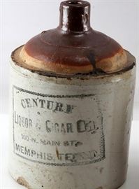 Antique Whiskey Jug by Century Liquor & Cigar Co., Memphis, Tennessee.  Antique Whiskey Jug by Century Liquor & Cigar Co., 100 N. Main Street, Memphis, Tennessee
Dimensions: 11.5" H
Artist or Maker: Century Liquor & Cigar Co.
Medium: pottery
Date: 19th Century