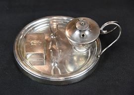 Unique English Edwardian Period Sterling Silver Standish / Inkstand | Clearly hallmarked London 1909 by Goldsmiths & Silversmiths Co. Ltd. | 10 oz (avdp 284 gms) | Dimensions: 2.75" H x 7" W x 5.75" D | Excellent Condition
Dimensions: 2 3/4"H x 7"W x 5 3/4"D
Medium: Sterling Silver - 10 ounces troy
Date: 1909
Condition Report: Excellent