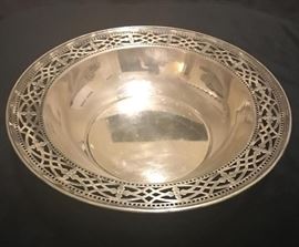 Antique Sterling Silver Tiffany & Co. Vegetable Bowl | Very Nice Reticulated Bowl in Excellent Condition | Makers Mark on verso reads "Tiffany & Co. Makers Sterling Silver M - 18278A & 10077" | Provenance: From a Prominent East 72nd Street, Manhattan Estate | Measurements: Reticulated bowl 10.25 Diameter | Weight approx. 18 ozt | Excellent Condition | No Monogram
Dimensions: Reticulated bowl 10.25" Diameter
Artist or Maker: Tiffany & Co.
Medium: Sterling Silver
Condition Report: Excellent Condition
Provenance: From a Prominent East 72nd Street, Manhattan Estate