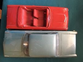 these 2 cars are salesman samples with car descriptions on bottom