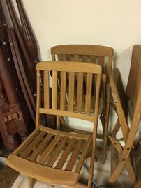 Set of four Kingsley-Bate teak folding chairs