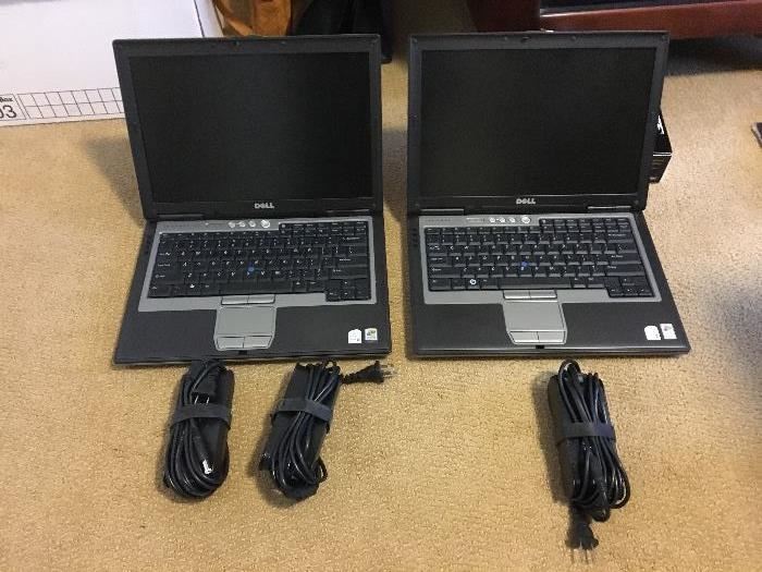 two Dell laptop computers