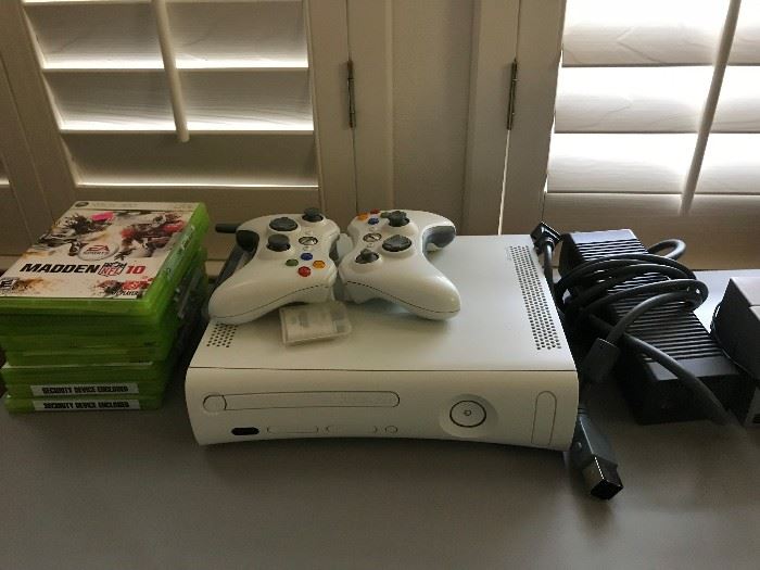 Xbox 360 with 2 controllers and memory card.