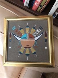 Navajo, Moon Face depicting a medicine man. Created using crushed sandstone.