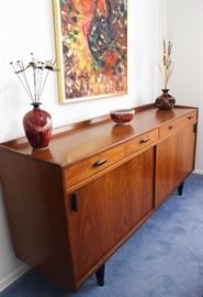 A beautiful solid wood mid-century buffet in excellent condition.