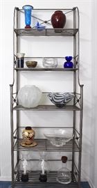 Art glass pieces, including Steuben and Lalique, metal decorative shelf unit.