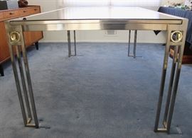Metal and glass 1980's dining room table in great condition!