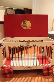 Vintage circus-cage child's toy chest with wheels