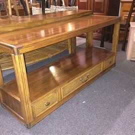  This is a sofa table or a hallway table made of solid oak with brass corner fittings. Has one large drawer in the mood for storage.  Dimensions are 54 inches long, 16 inches wide, 26 inches tall 