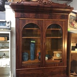  Beautiful walnut burled secretary with book hutch. This was made before the Civil War and has the original key. 