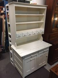Antique bakers hutch. Has flower bin and spice drawers. This comes into pieces