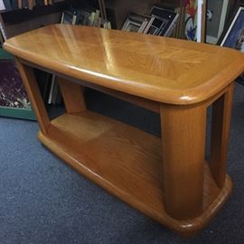 Sofa table or coffee table, laminated Oak. 24 inches tall, 4 feet long, 18 inches wide.
 There are two of these available 